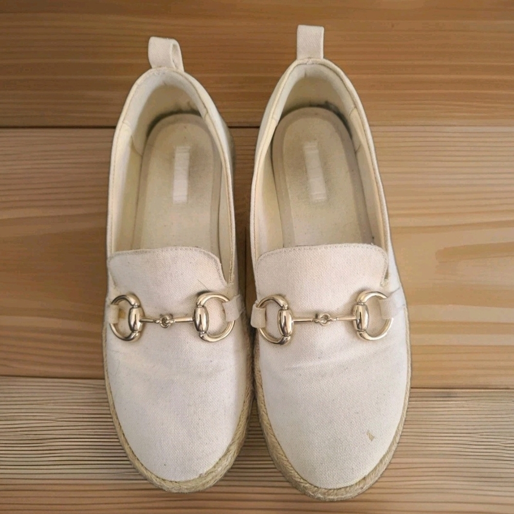 Chic Cream Loafers with Gold Detail